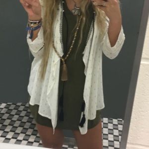 White print cardigan with black tassels